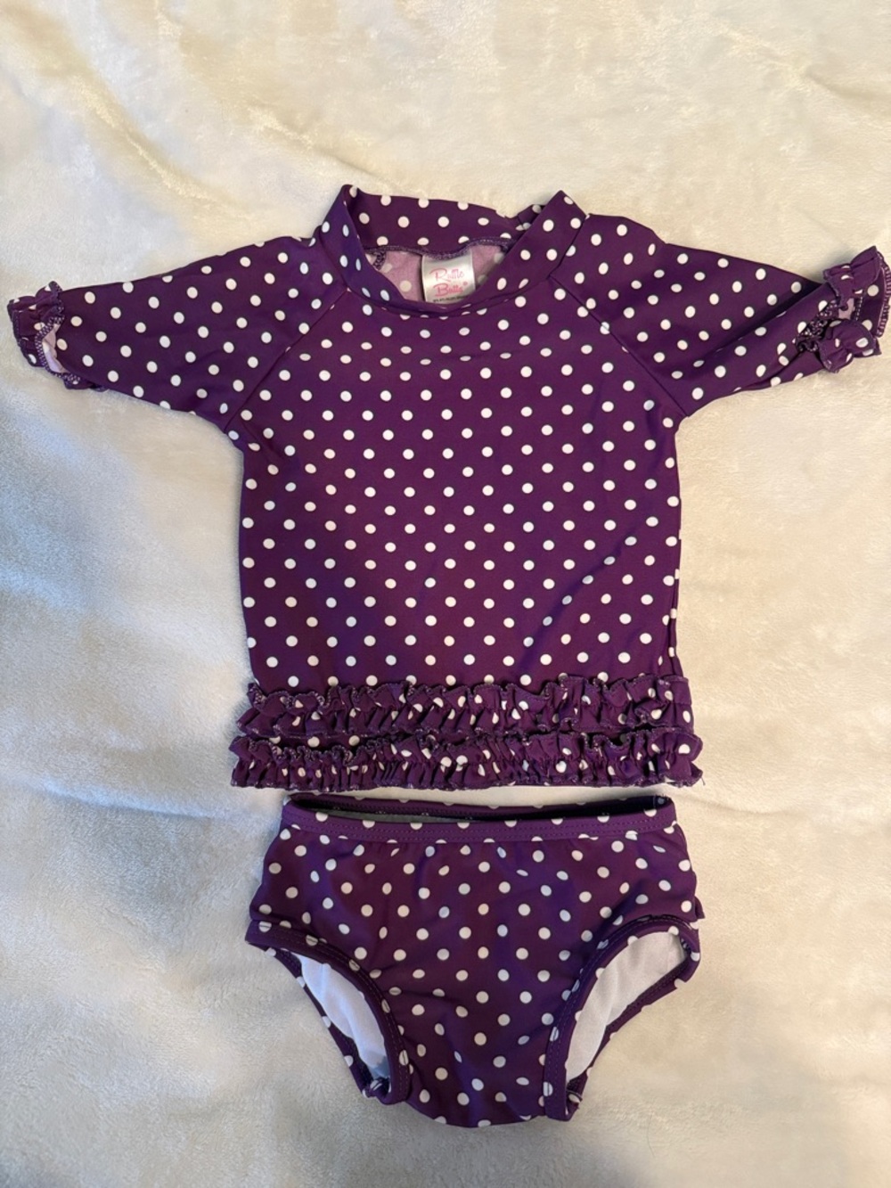 Ruffle Butts Purple and White Polka Dot Two-Piece Swim Set used once